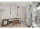 Basement utility area with water heater, flooring and storage at 1438 Plumstead Rd, Charlotte, NC 28216