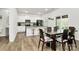 Spacious kitchen and dining area with stainless steel appliances and granite countertops at 16138 Aryshire Green Ct, Charlotte, NC 28273