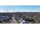 Scenic aerial view of a residential street with lush trees and a distant cityscape at 1738 Matheson Ave, Charlotte, NC 28205