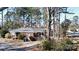Lovely brick home featuring a well-maintained exterior, inviting entrance and mature landscaping at 1738 Matheson Ave, Charlotte, NC 28205