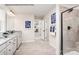 Bright bathroom featuring dual vanities, modern fixtures, and a glass-enclosed shower for a spa-like experience at 1805 Ab Moore Jr Dr # 3237, Indian Trail, NC 28079
