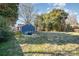 Large backyard with a patio and barbeque grill perfect for outdoor activities at 2137 Highland St, Charlotte, NC 28208