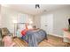 Serene bedroom with hardwood floors, neutral tones, and ample closet space at 2137 Highland St, Charlotte, NC 28208