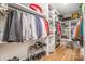 Walk-in closet with custom shelving and hardwood floors providing lots of storage space at 2137 Highland St, Charlotte, NC 28208
