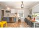 Bright dining area with a modern light fixture and views of the outdoors at 2137 Highland St, Charlotte, NC 28208