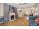 Spacious living room with open floor plan and decorative fireplace offers a welcoming space at 2137 Highland St, Charlotte, NC 28208
