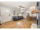 Comfortable living room featuring a plush sofa, and lots of light with hardwood floors at 2137 Highland St, Charlotte, NC 28208