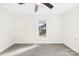 Neutral bedroom with plush carpet, a ceiling fan, and a bright window at 216 Blackwelder St, Kannapolis, NC 28081