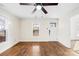 Inviting living room features hardwood floors, new paint, and a view of the front yard at 216 Blackwelder St, Kannapolis, NC 28081