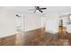 Bright living room flows into a modern kitchen with updated appliances and hardwood floors at 216 Blackwelder St, Kannapolis, NC 28081