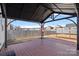 Spacious backyard with covered patio, wooden deck, privacy fence, and plenty of room to entertain at 2462 Willow Pond Se Ln, Concord, NC 28025