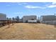 Spacious backyard featuring a well-maintained lawn and privacy fence at 2462 Willow Pond Se Ln, Concord, NC 28025