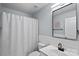 Clean bathroom featuring a shower with modern vanity and soft blue walls at 2462 Willow Pond Se Ln, Concord, NC 28025