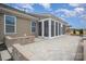 Backyard with patio, and a screened sunroom offers scenic views and outdoor living at 4018 Moxie Way, Charlotte, NC 28215