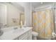 Bathroom featuring a vanity and a shower-tub combo at 4018 Moxie Way, Charlotte, NC 28215