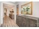 Inviting entryway with hardwood floors, decorative mirror, and stylish console table at 4018 Moxie Way, Charlotte, NC 28215