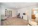 Spacious living room with built-in shelves and carpeted floors is perfect for relaxing at 4018 Moxie Way, Charlotte, NC 28215