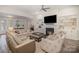 Spacious living room with fireplace, built-in shelving, and comfortable seating at 4018 Moxie Way, Charlotte, NC 28215