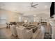 Bright open-concept living space featuring fireplace, recessed lighting, and an adjacent dining area at 4018 Moxie Way, Charlotte, NC 28215