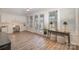 Bright office space with built-in cabinets, a desk, and multiple windows at 4018 Moxie Way, Charlotte, NC 28215