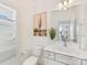 A bright bathroom features a white vanity, modern fixtures, and a shower-tub combo at 4039 Highgate Ln, Lancaster, SC 29720