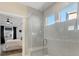 Luxurious bathroom with glass shower, tile surround, and view of the primary bedroom at 4039 Highgate Ln, Lancaster, SC 29720
