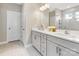 Beautifully appointed bathroom featuring a double sink vanity, quartz countertops, and tile flooring at 4039 Highgate Ln, Lancaster, SC 29720