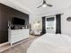 Beautifully appointed bedroom with accent wall, modern furniture, and lots of natural light at 4039 Highgate Ln, Lancaster, SC 29720