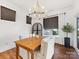 Bright dining area features an elegant chandelier, natural light, and neutral finishes at 4039 Highgate Ln, Lancaster, SC 29720