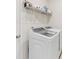 The laundry room includes a new, efficient washing machine with a folding shelf above at 4039 Highgate Ln, Lancaster, SC 29720
