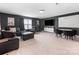 Expansive living room with ample seating, a large tv, and a whiteboard, ideal for movie nights or gatherings at 4039 Highgate Ln, Lancaster, SC 29720