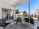 Inviting outdoor patio with screened-in porch, stylish furniture, and views of the backyard at 4039 Highgate Ln, Lancaster, SC 29720