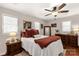 Cozy bedroom with hardwood floors, ceiling fan, and warm, inviting decor at 4919 Rehobeth Rd, Waxhaw, NC 28173