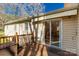 Cozy deck with table and chairs and a sliding glass door leading inside at 4919 Rehobeth Rd, Waxhaw, NC 28173