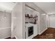 Convenient laundry area with modern washer and dryer units located on a landing area at 4919 Rehobeth Rd, Waxhaw, NC 28173