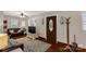 Inviting living room with hardwood floors, a decorative rug, and plenty of natural light at 4919 Rehobeth Rd, Waxhaw, NC 28173