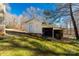 Exterior view of a shed with grass lawn, side door and garage door at 4919 Rehobeth Rd, Waxhaw, NC 28173