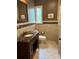 Cozy bathroom with tiled shower and a decorative granite countertop sink at 536 S Union S St, Concord, NC 28025
