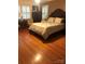 Cozy bedroom showcasing hardwood floors and bright natural light from the lovely windows at 536 S Union S St, Concord, NC 28025