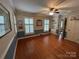 Bright bedroom featuring hardwood floors, natural light, and modern decor at 536 S Union S St, Concord, NC 28025