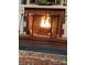 Cozy brick fireplace with roaring fire, perfect for chilly evenings and seasonal decor at 536 S Union S St, Concord, NC 28025