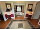 Elegant foyer features hardwood floors, decorative rugs, and an open view into the formal dining room at 536 S Union S St, Concord, NC 28025