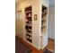 Cozy hallway with built-in shelving units, showcasing decorative items and Gathering photos at 536 S Union S St, Concord, NC 28025