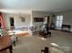 Bright living room with hardwood floors, chandelier, and natural light from the large window at 536 S Union S St, Concord, NC 28025