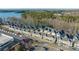 Overhead view of townhome community next to lake, showing proximity to waterfront and amenities at 554 Amalfi Dr, Davidson, NC 28036