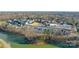 Aerial shot showcases waterfront townhome community, with lake views and convenient parking at 554 Amalfi Dr, Davidson, NC 28036