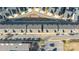 Aerial shot of townhome community highlighting rooflines, parking, and street layout at 554 Amalfi Dr, Davidson, NC 28036