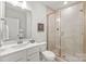 Modern bathroom featuring shower, toilet, and sink at 554 Amalfi Dr, Davidson, NC 28036
