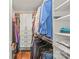 Walk-in closet featuring built-in shelving and plenty of storage at 554 Amalfi Dr, Davidson, NC 28036