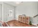 Hardwood entryway with a door to the porch at 554 Amalfi Dr, Davidson, NC 28036